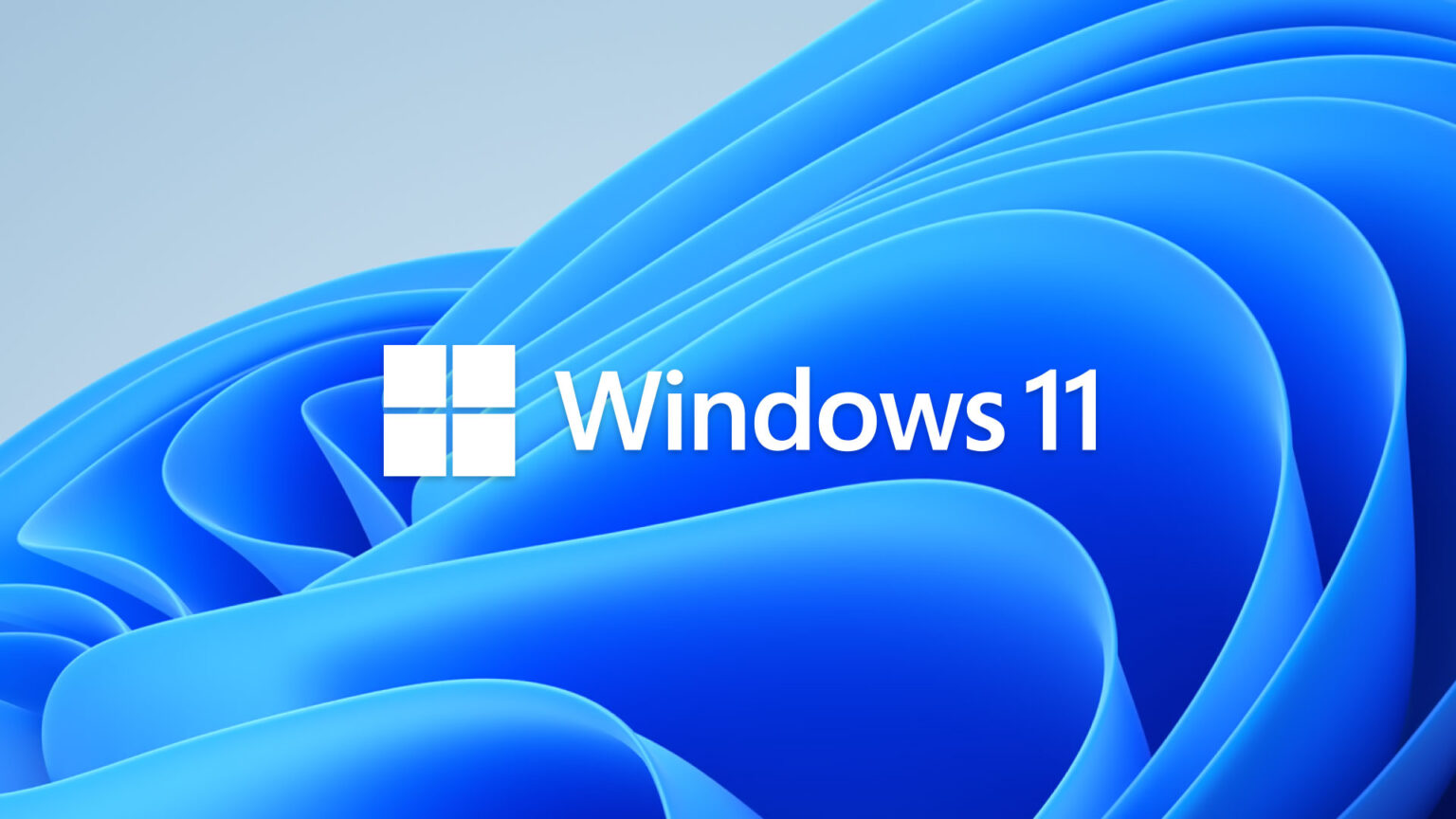 8 powodów, dla których warto przejść na Windows 11. Poznaj je wszystkie Windows 11 logo z napisem